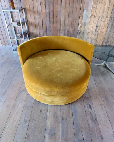 Round velvet armchair