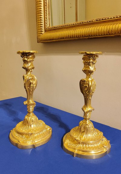 Pair of Flambeaux in gilded chiselled bronzes Rocaille d'aprés Meissonnier 19th century