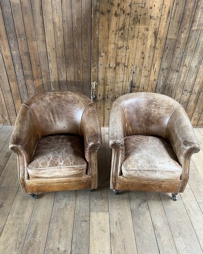 Pair of leather club chairs