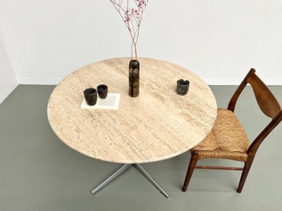 Round travertine marble dining table with chrome base, 1970s.