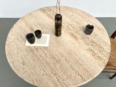 Round travertine marble dining table with chrome base, 1970s.