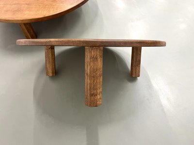 Pair of large modernist tripod coffee tables