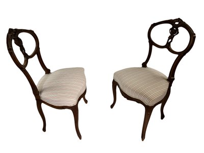 Pair of Louis XV style chairs in carved walnut – 19th century