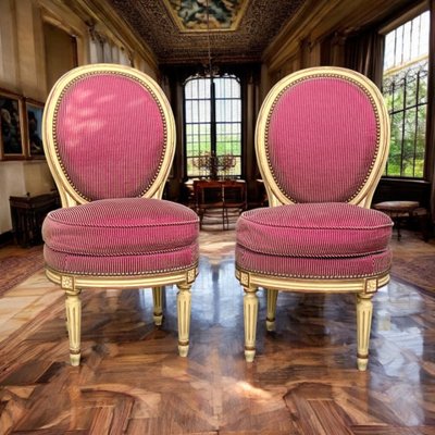 PAIR OF ANTIQUE LOUIS XVI STYLE LOUNGE CHAUFFEUSES WELL UPHOLSTERED WITH FABRIC