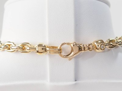 Yellow gold and diamond filing chain necklace