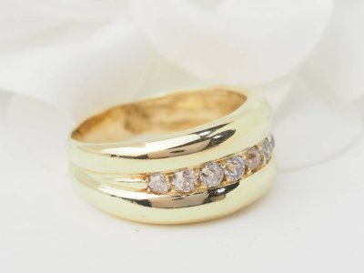 Yellow gold and diamond bangle ring