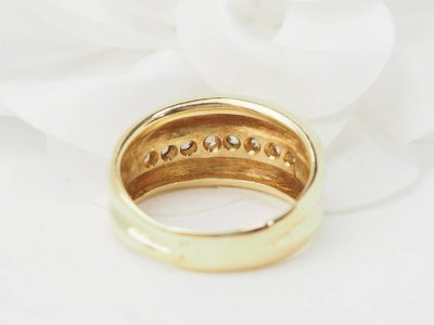 Yellow gold and diamond bangle ring