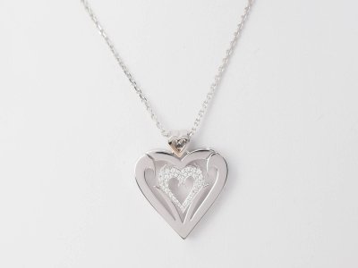 Collier coeur en or blanc et diamants