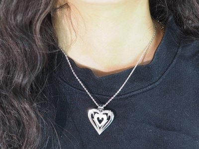 Collier coeur en or blanc et diamants