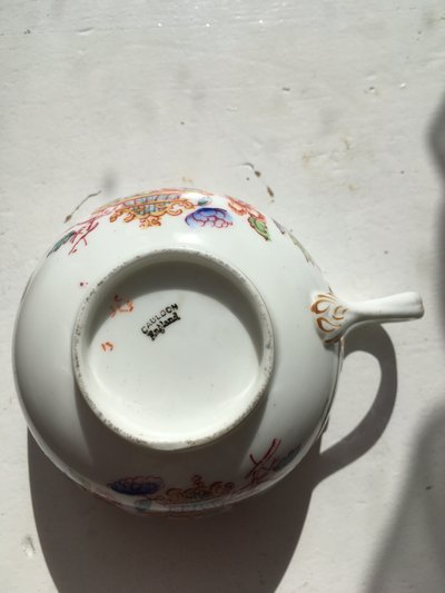 Cauldon porcelain tea cup with Minton design