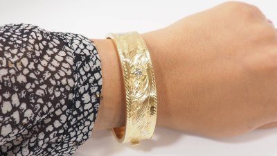 Bracciale schiavo in oro giallo