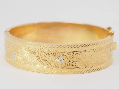 Bracciale schiavo in oro giallo