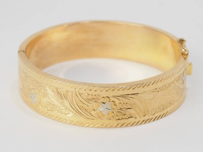 Bracciale schiavo in oro giallo