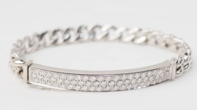 Bracciale flessibile in oro bianco con pavé di diamanti