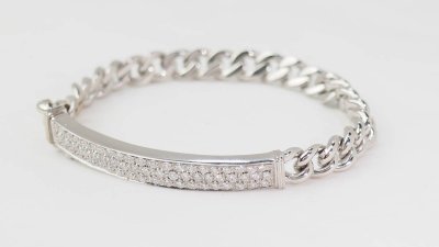 Flexible bracelet in white gold paved with diamonds