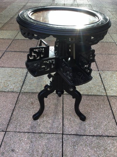 A pedestal table in blackened wood, Napoleon III period