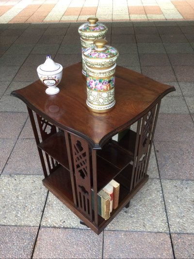 A revolving mahogany bookcase.