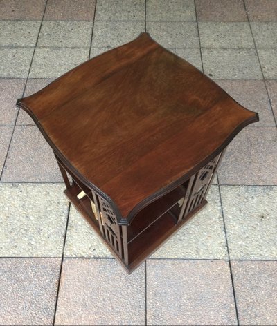 A revolving mahogany bookcase.