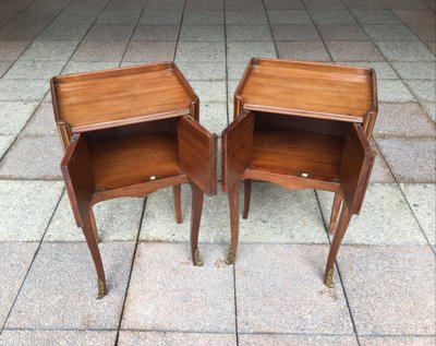 A Pair of Louis XV Style Marquetry Bedside Tables