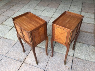 A Pair of Louis XV Style Marquetry Bedside Tables