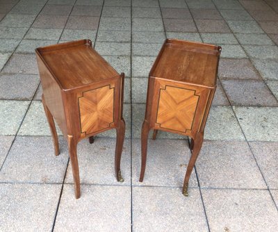 A Pair of Louis XV Style Marquetry Bedside Tables