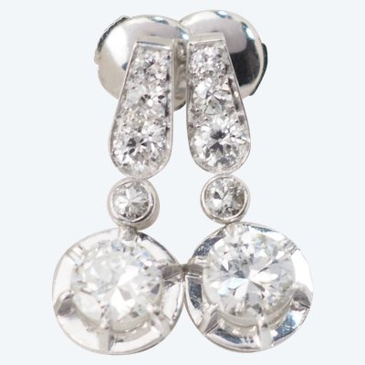 Pair of antique sleeper earrings in white gold and diamonds