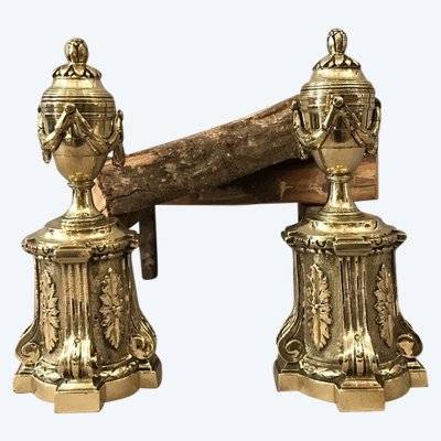 Pair of antique bronze andirons from the 19th century in Louis XVI style