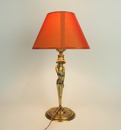 Coppia di lampade "Atlantidee" in bronzo