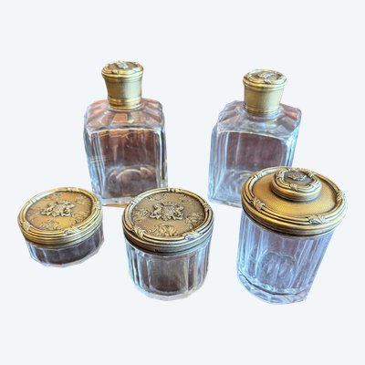 SET OF POTS AND TOILETRY BOTTLES BY A. AUCOC SILVERWARE