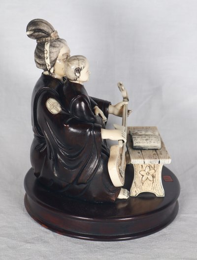 Okimono in wood and ivory, Meiji period Japan