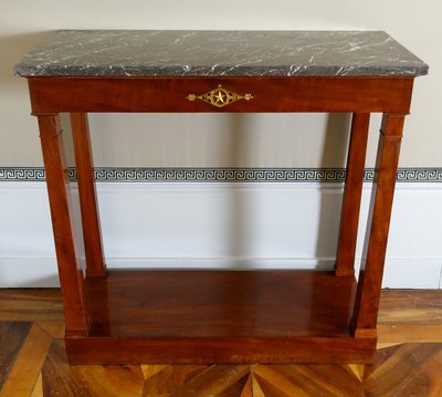 Consulate period console in mahogany and mercury-gilt bronze