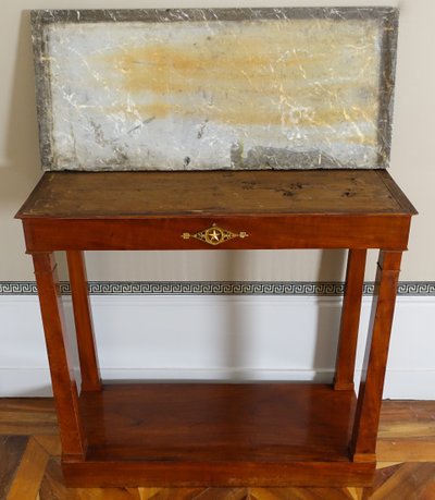 Consulate period console in mahogany and mercury-gilt bronze