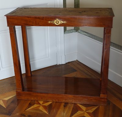 Consulate period console in mahogany and mercury-gilt bronze