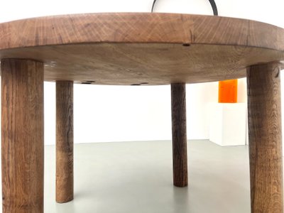 Circular solid oak dining table, circa 1950