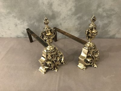 Pair of antique bronze andirons from the 19th century in Louis XV / Louis XVI style