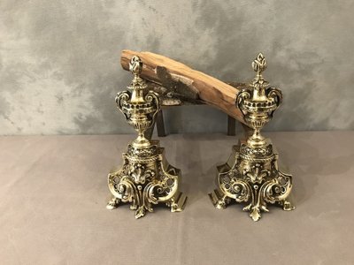 Pair of antique bronze andirons from the 19th century in Louis XV / Louis XVI style