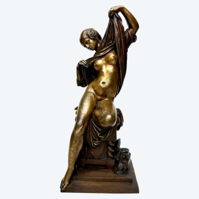 Bronze Sculpture of a Seated Woman Undressing