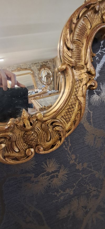 Mid-20th century mirror, gilded wood, 95 x 67