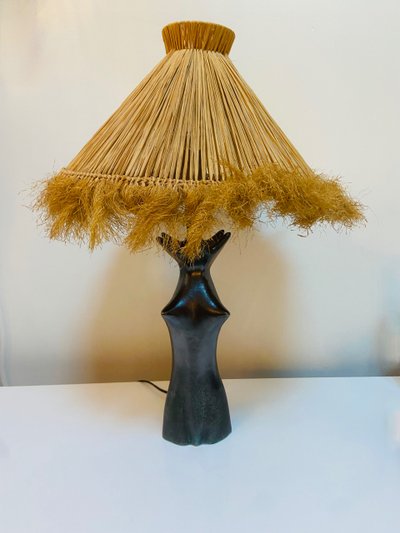 Black glazed ceramic lamp in the shape of a woman attributed to Jacques Blin