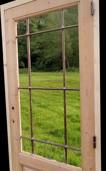 Old Wood And Metal Door With Its Door Frame