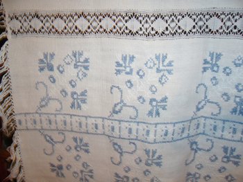 Embroidered linen and lace tablecloth, EA monogram circa 1900