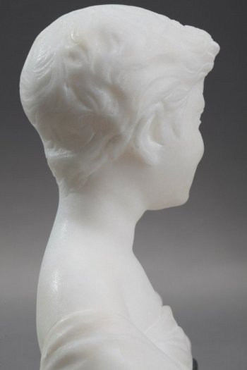 Small Bust Representing A Young Boy In Alabaster