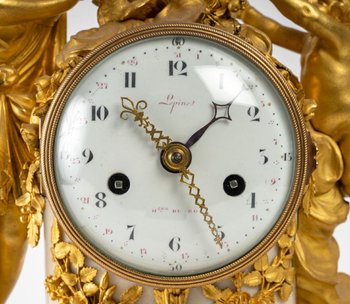 Orologio in bronzo dorato e marmo bianco del XVIII secolo