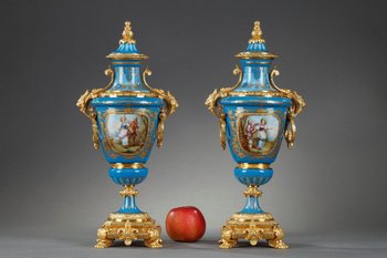 Pair Of Polychrome Porcelain Covered Vases In The Sèvres Style