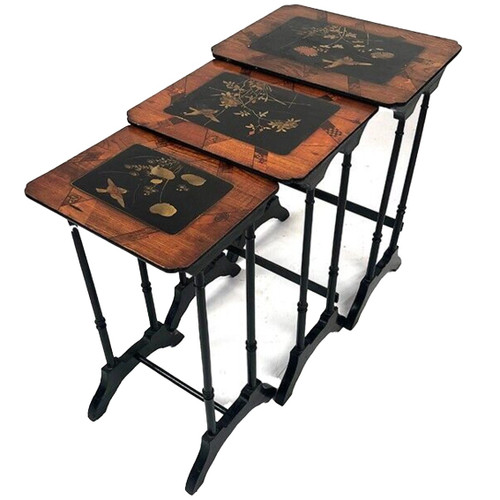 Set of three nesting tables, lacquered and decorated with birds and marquetry. Circa 1900