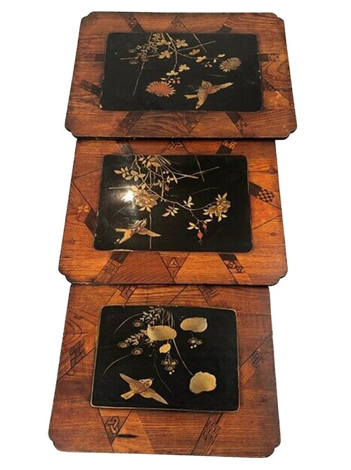 Set of three nesting tables, lacquered and decorated with birds and marquetry. Circa 1900