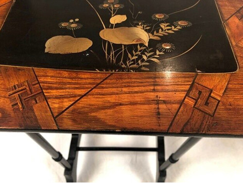 Set of three nesting tables, lacquered and decorated with birds and marquetry. Circa 1900