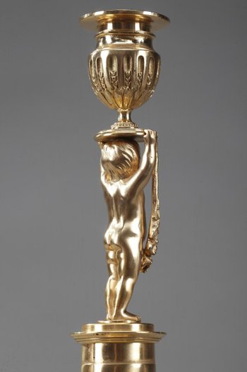 Gilded Bronze Pedestal Candleholders with Putti decoration, 19th Century