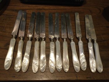 12 silver and mother-of-pearl dessert knives