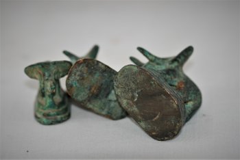 Set of three small opium weights, Siam.